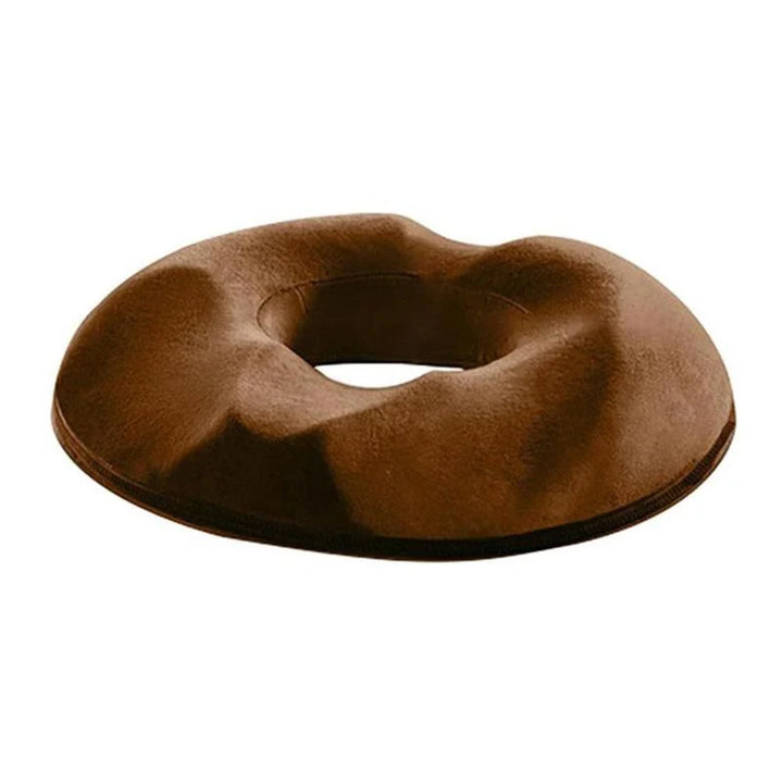 Removable washable cover on donut cushion with zip closure for easy maintenance