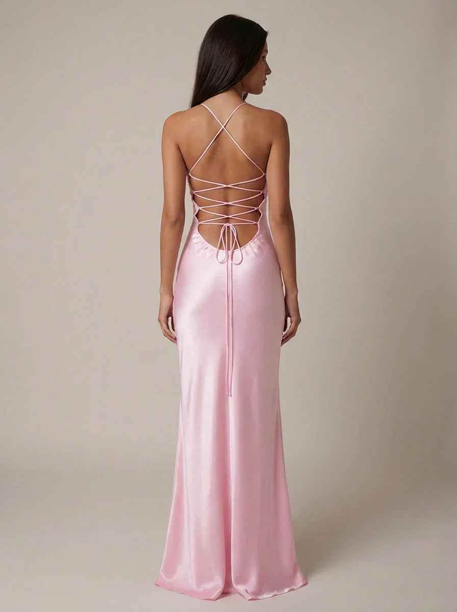 Pink formal maxi dress with halter neck tie and beaded embellishment on bodice