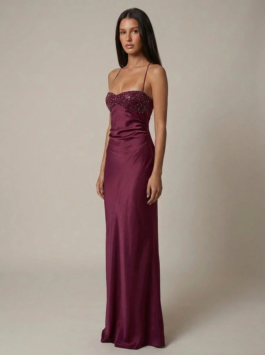 Empire waist halter maxi dress with smooth finish and elegant floor-length cut