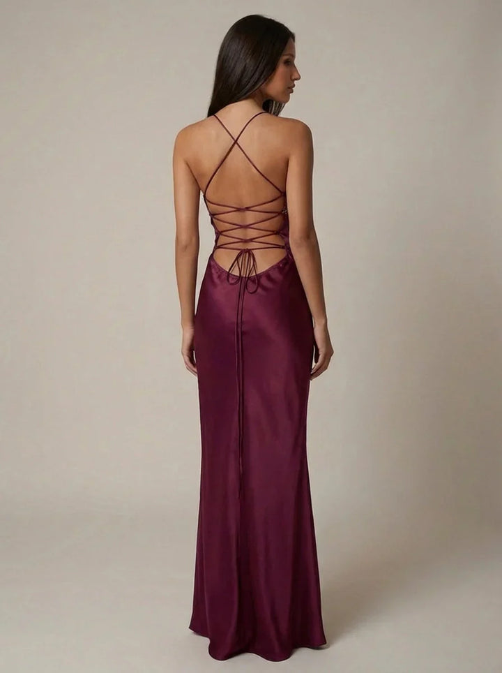 Pink halter maxi dress showing full-length silhouette and beaded neckline detail