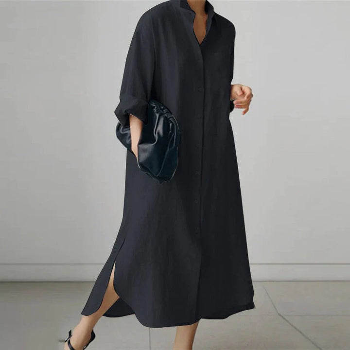 Close-up view of oversized cotton shirt dress showing relaxed fit and side slit detail
