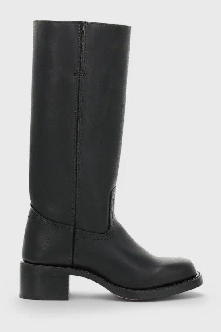 Side angle of women's knee-high heeled boots showing block heel elevation