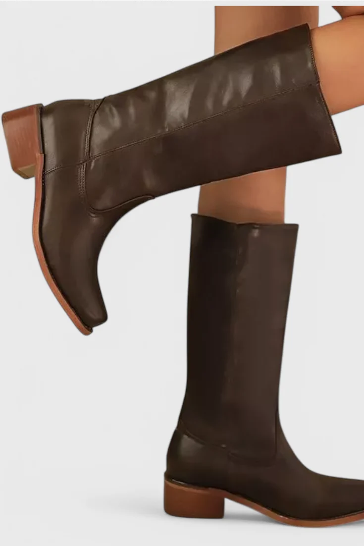Close-up view of Classic Knee-High Heeled Boots showing rounded toe and visible topstitching detail