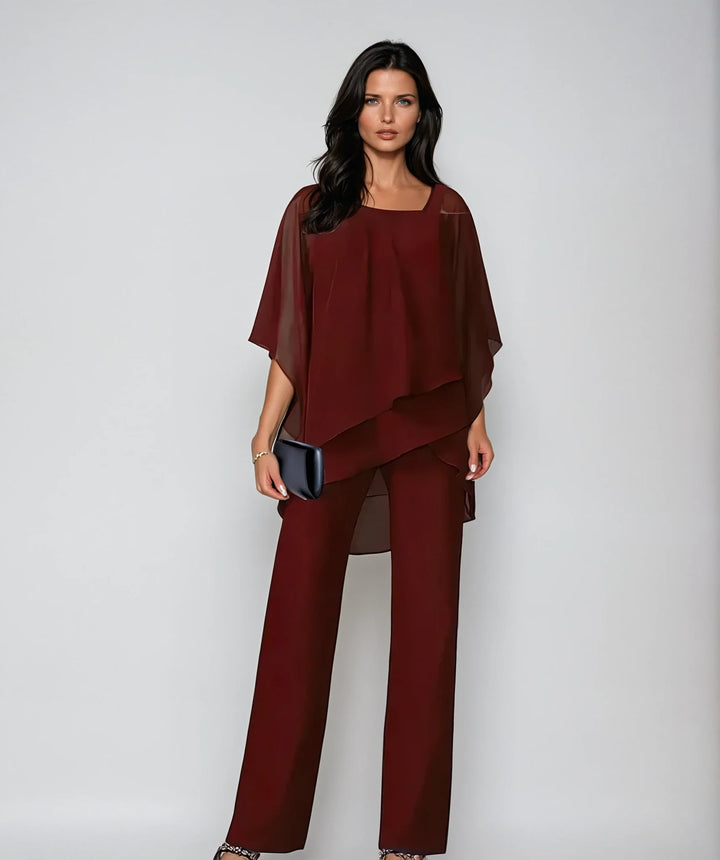 Full-length view of women's flowing two-piece set styled for occasion wear
