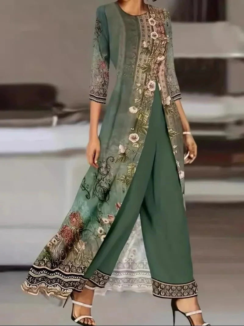 Forest green floral overlay two-piece set with botanical print top and wide-leg trousers featuring decorative border trim