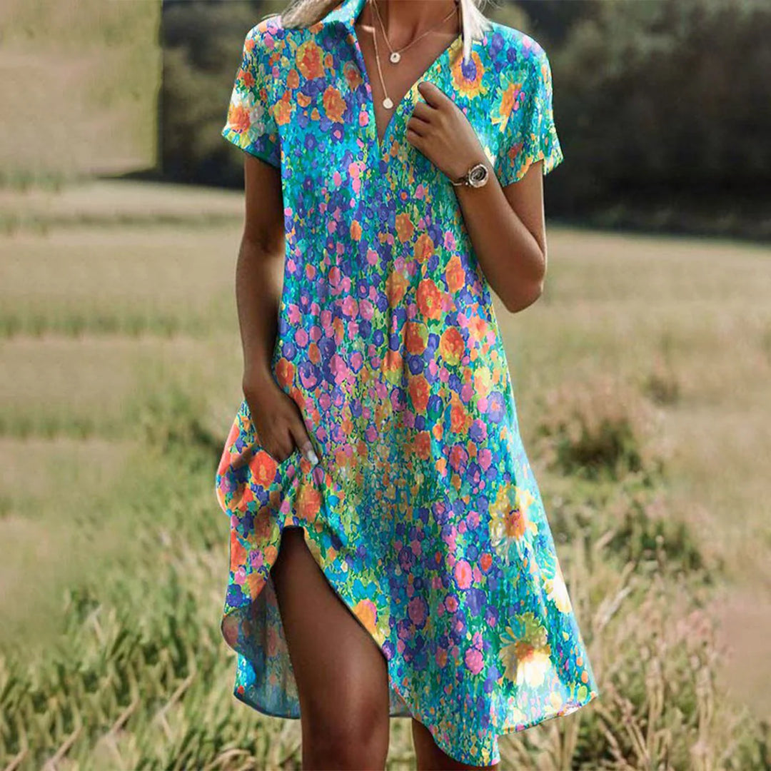 Close-up view of polka dot midi dress showing scattered white dot pattern and gathered waist
