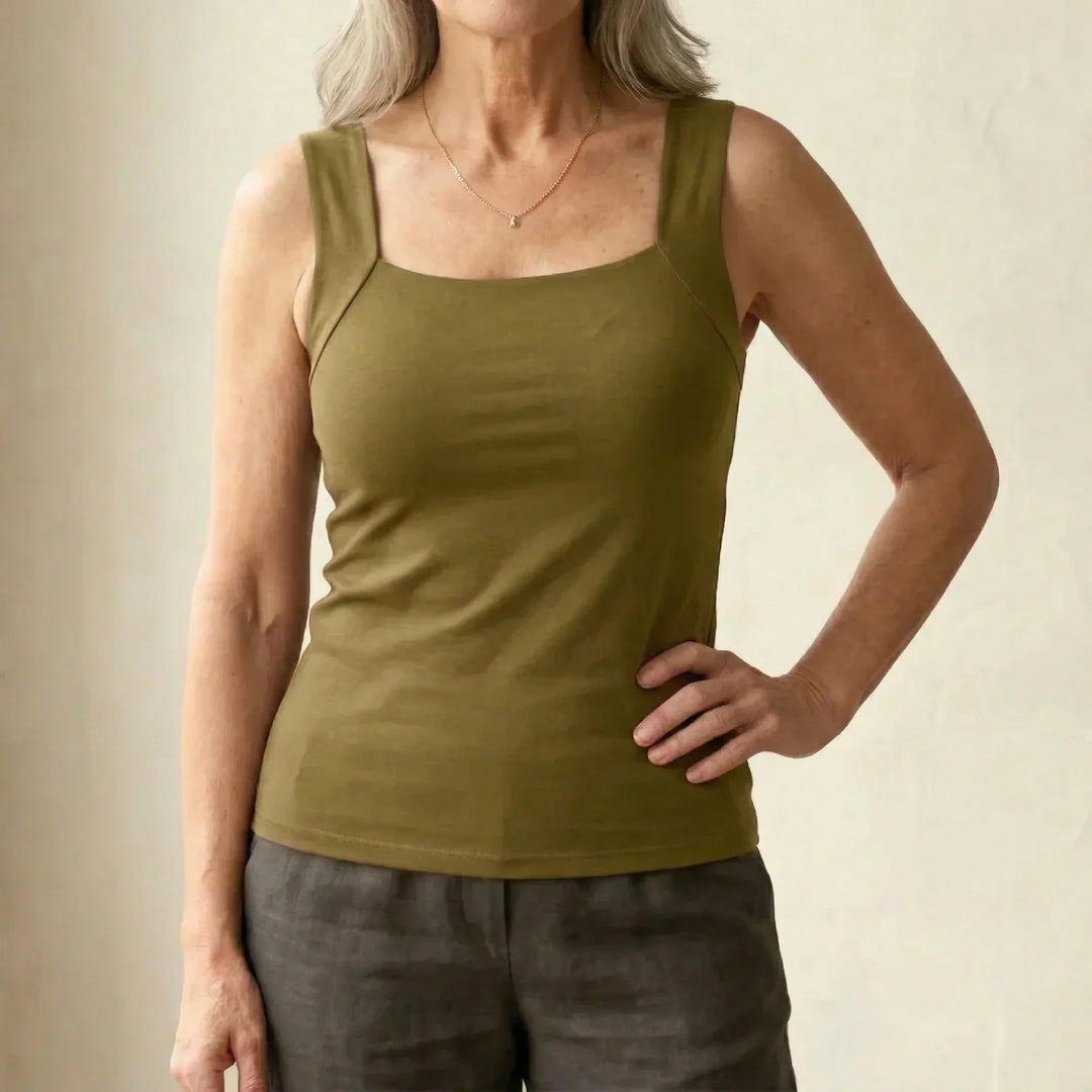 Side angle of square neck tank top displaying comfortable fit and smooth drape on body