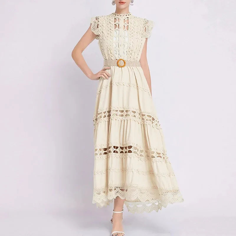 Full-length view of tiered lace maxi dress with fitted bodice and flowing skirt