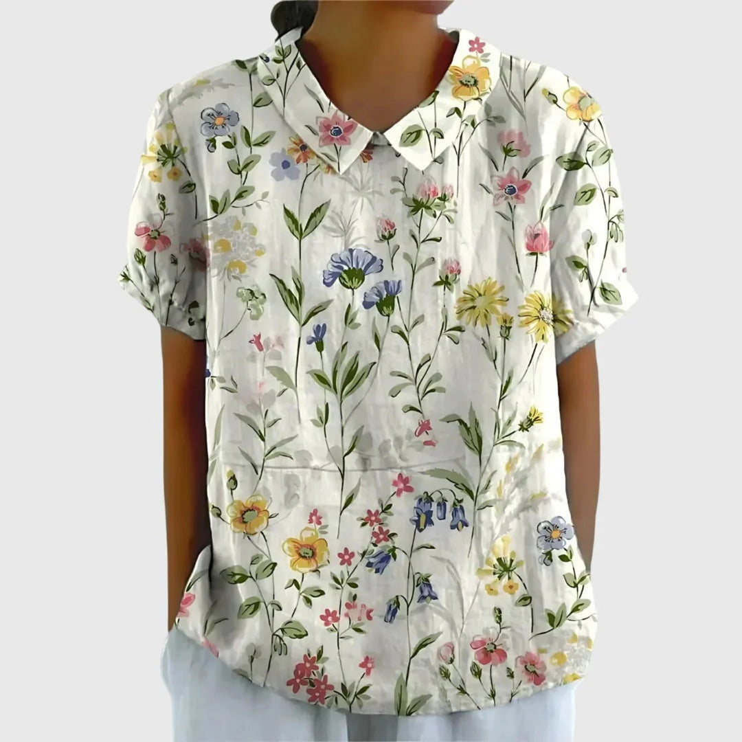 Women's linen floral blouse with Peter Pan collar and botanical print on white background