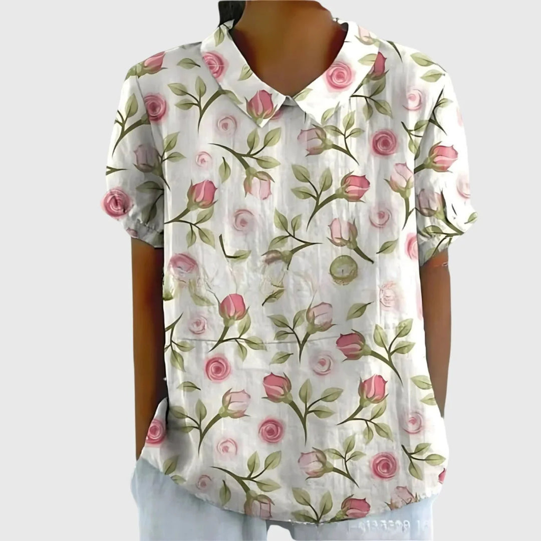 Side view of women's linen floral blouse displaying relaxed fit and button-through front