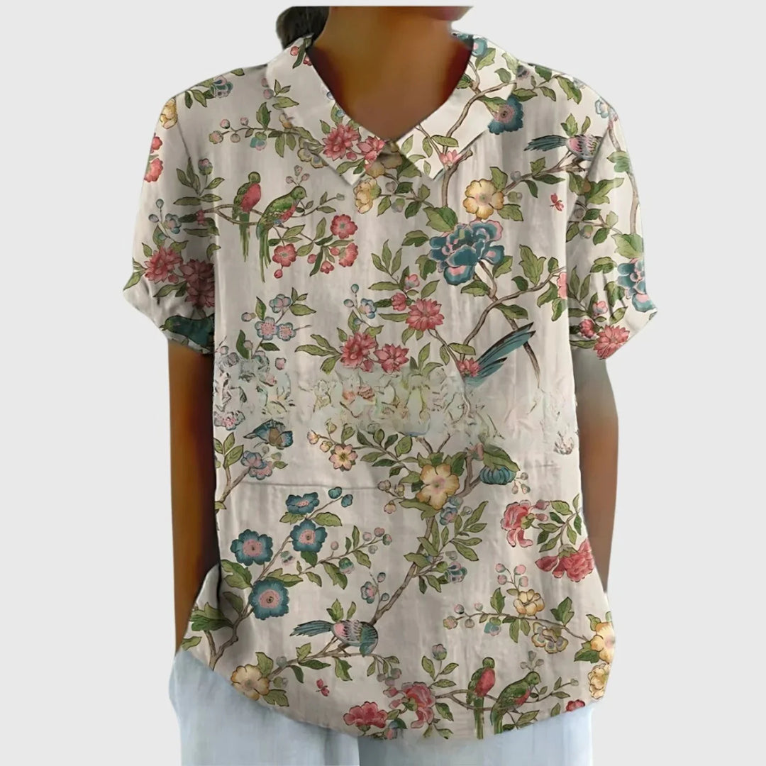 Women's linen floral blouse in sage green colourway with climbing flower pattern
