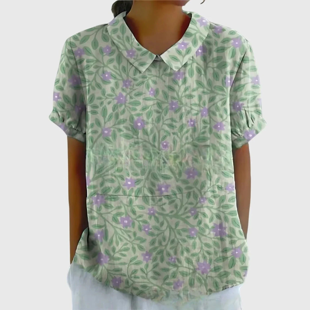 Women's linen floral blouse in dusty blue colourway with delicate flower design