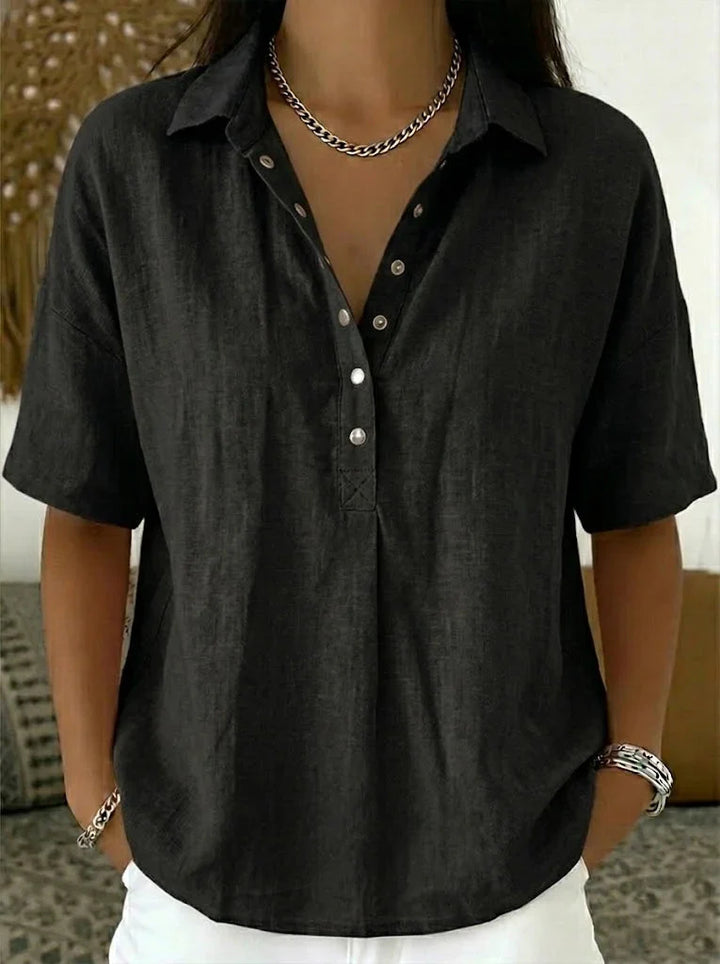 Back view of a casual button-up collar shirt showing the relaxed silhouette and short sleeve cut