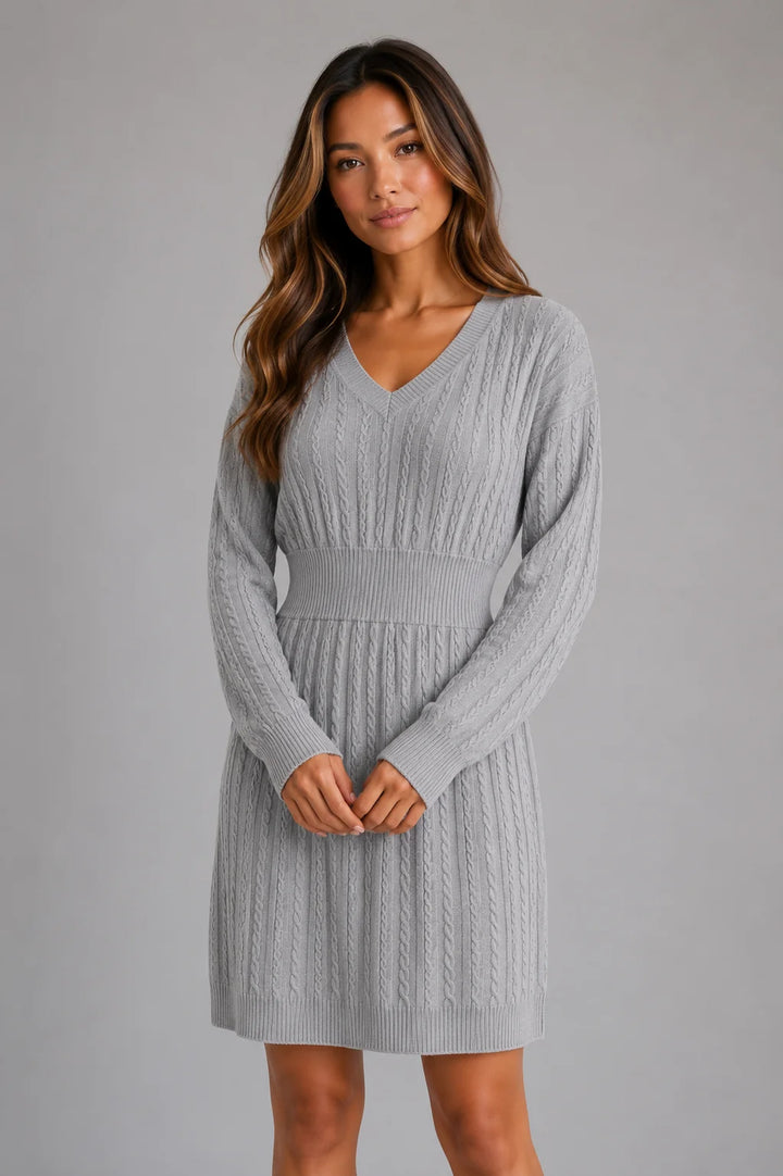 Full-length view of cable knit midi dress with long sleeves and ribbed cuffs