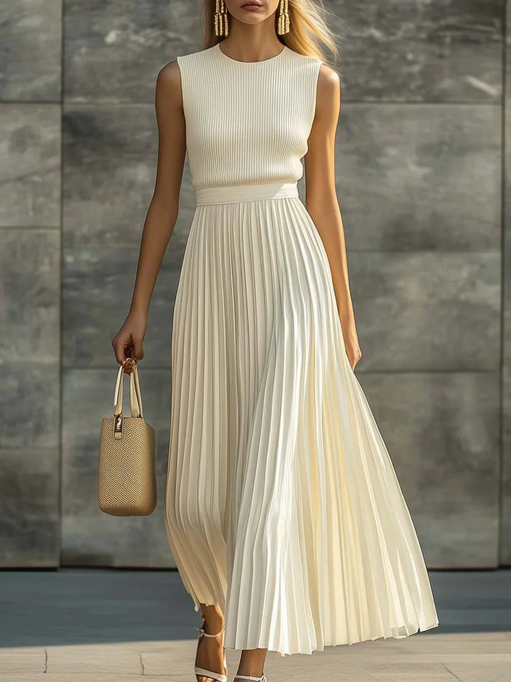 Women's Sleeveless Knit Pleated Chiffon Maxi Dress in cream with ribbed bodice and flowing pleated skirt