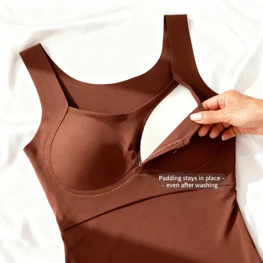 Woman styling square neck tank top with tailored trousers for casual daywear