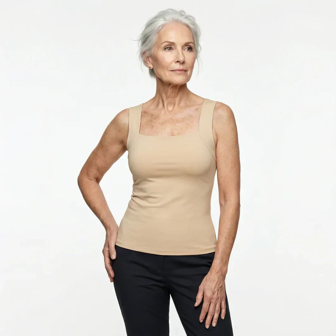 Woman wearing square neck tank top in taupe shade with relaxed styling