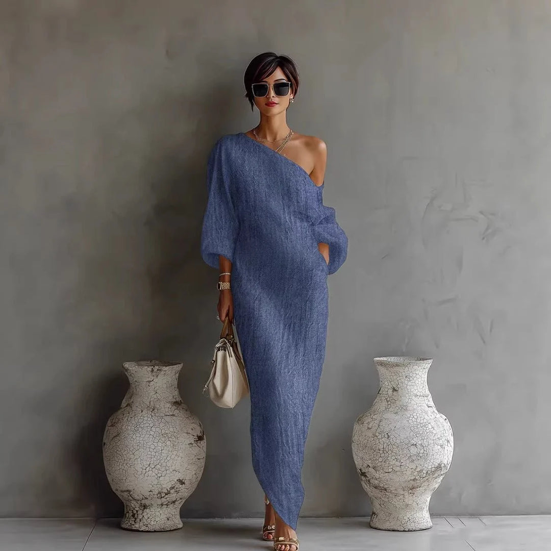 Close-up of textured fabric and lantern sleeve detail on off-shoulder maxi dress