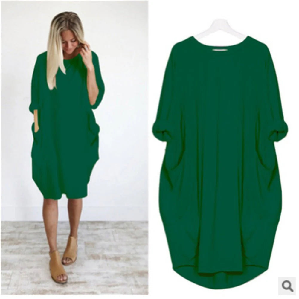 Detail of oversized midi dress fabric showing soft feel and comfortable stretch