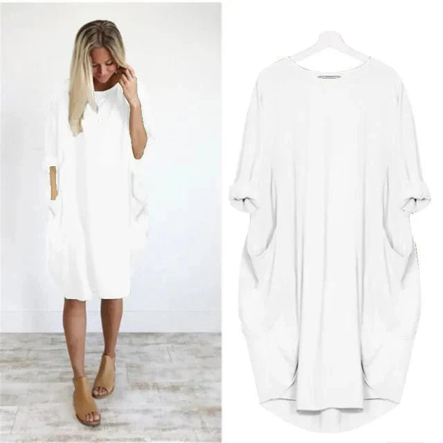 Oversized midi dress with round neckline and comfortable batwing sleeves for everyday wear