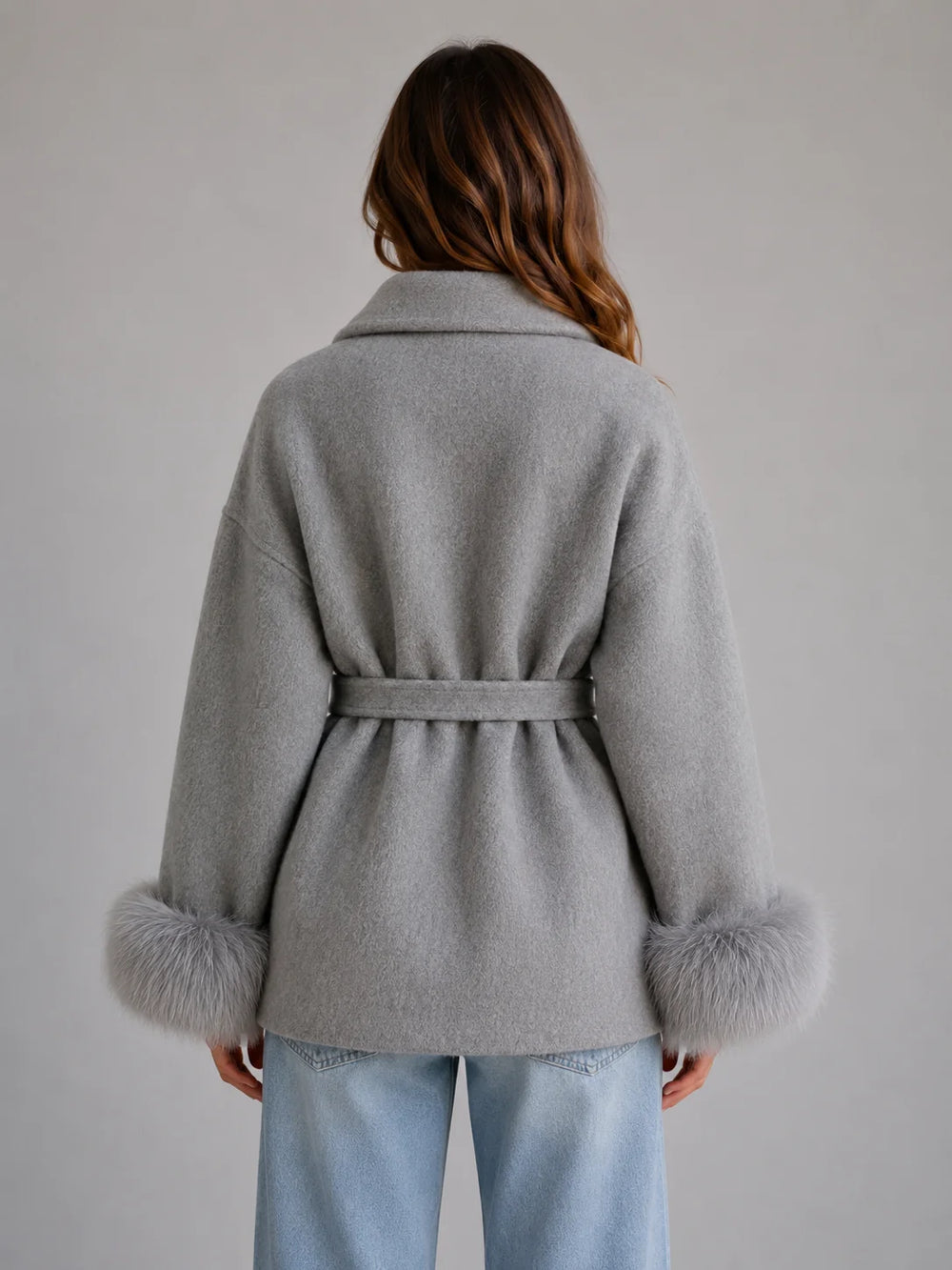 Belted wrap coat with self-tie waist belt and relaxed silhouette for flattering fit