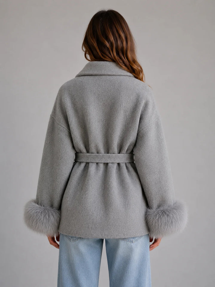 Belted wrap coat with self-tie waist belt and relaxed silhouette for flattering fit