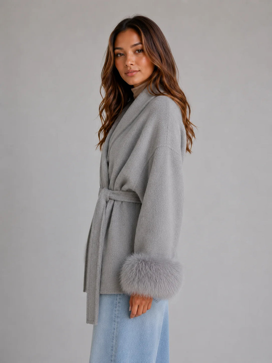 Grey wool blend coat featuring detachable faux fur trim cuffs and shawl collar detail