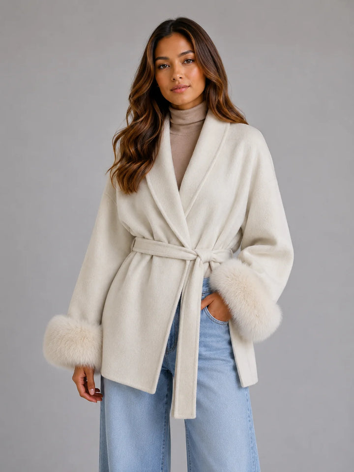 Women's wrap coat with structured fabric and elegant shawl collar for winter styling