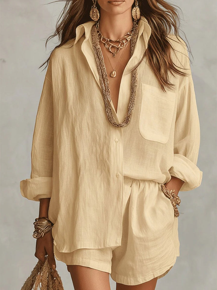 Detail of linen shirt cuffs and lightweight breathable fabric drape in neutral tone