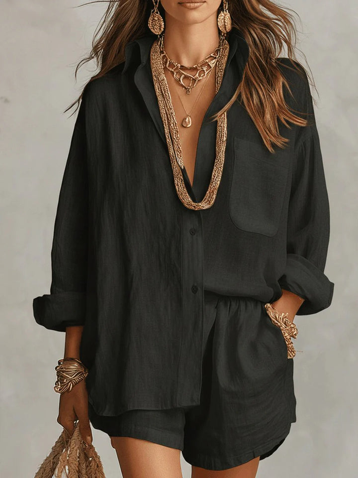 Full-length view of two-piece linen set styled with rolled sleeves and casual summer accessories