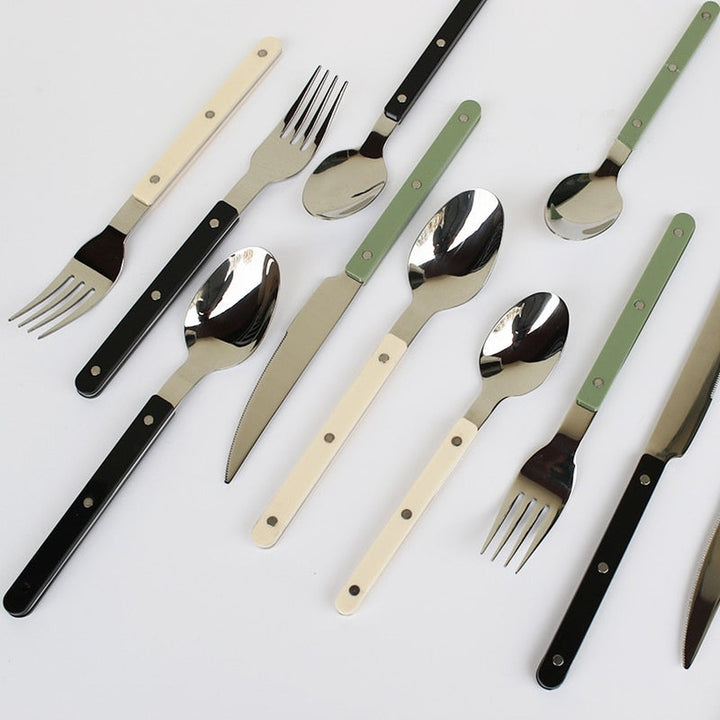 BistroLine black stainless steel cutlery set, close-up of engraved handle detail