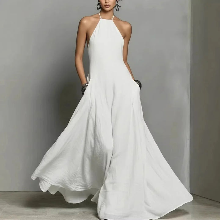 Full-length view of halter neck maxi dress styled for summer occasions and holidays