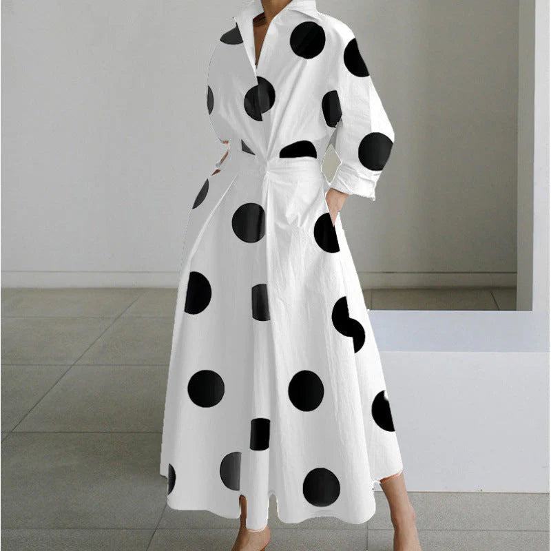 Newspaper print collared maxi dress on model demonstrating versatile styling for daytime wear