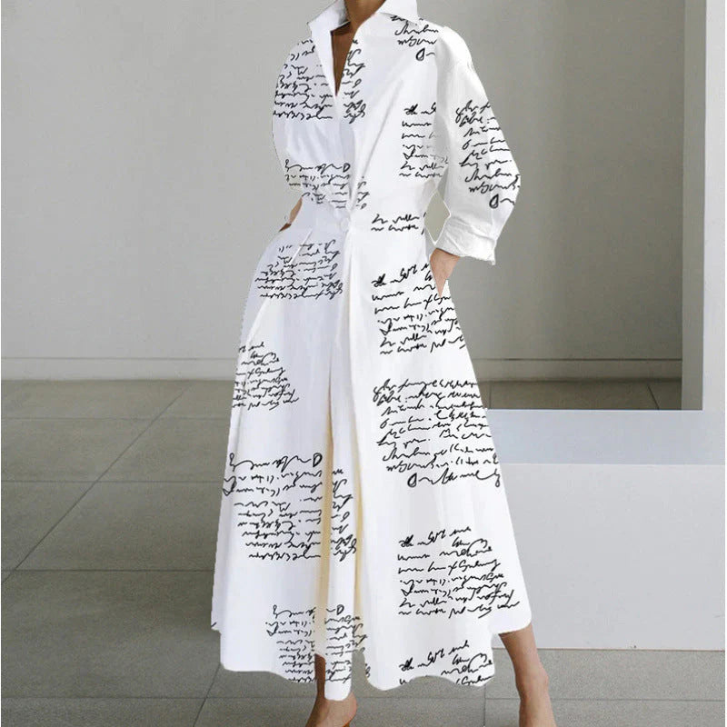 Model wearing newspaper print collared maxi dress styled with statement belt and heels