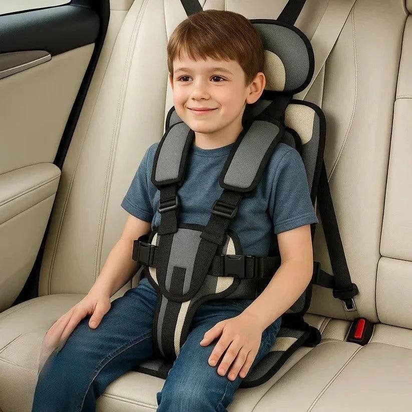 Compact child car seat featuring padded head and torso support with adjustable harness for growing children on journeys