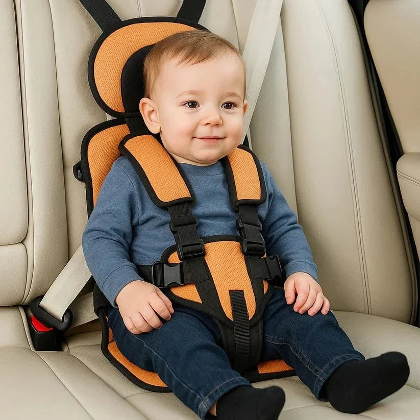 Foldable child travel car seat showing adjustable five-point harness system and compact padded design for easy transport