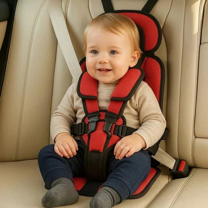 Compact foldable car seat with five-point restraint system and supportive padding for toddlers during vehicle journeys