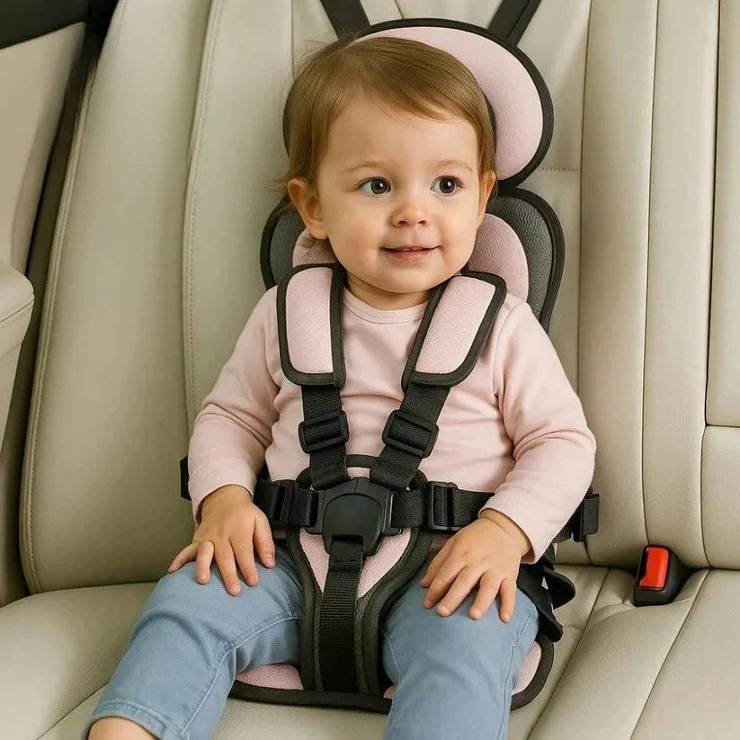 Portable child car seat featuring adjustable harness buckles and padded blue cushions for comfortable travel positioning