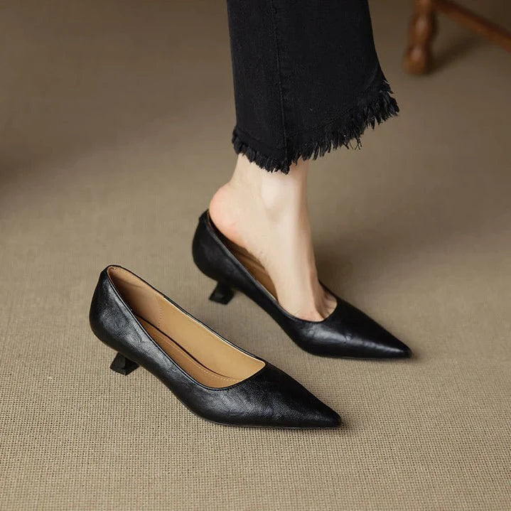 Women's leather heels in burgundy with artisan-crafted pointed-toe and refined stiletto comfort