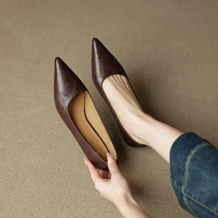 Burgundy leather heels with pointed-toe and refined stiletto heel for polished day-to-night styling