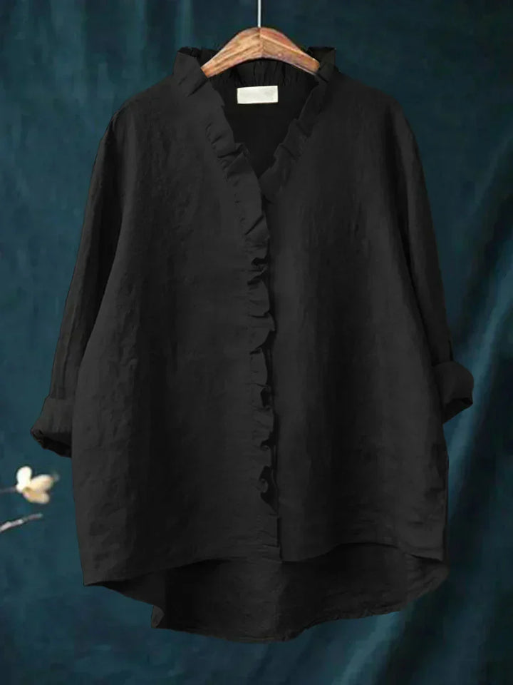 Detail of soft woven fabric texture and natural drape on women's casual office blouse