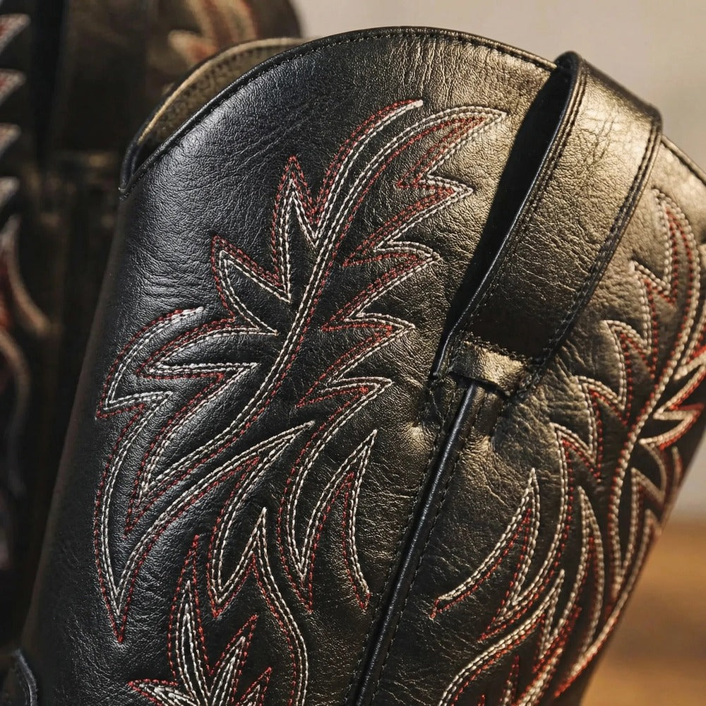Claude black cowboy-style boots, heel and sole detail