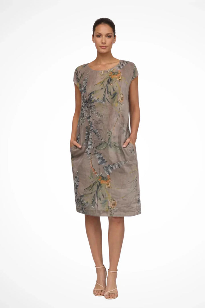Sleeveless shift dress in white with nature-inspired botanical print for summer wear