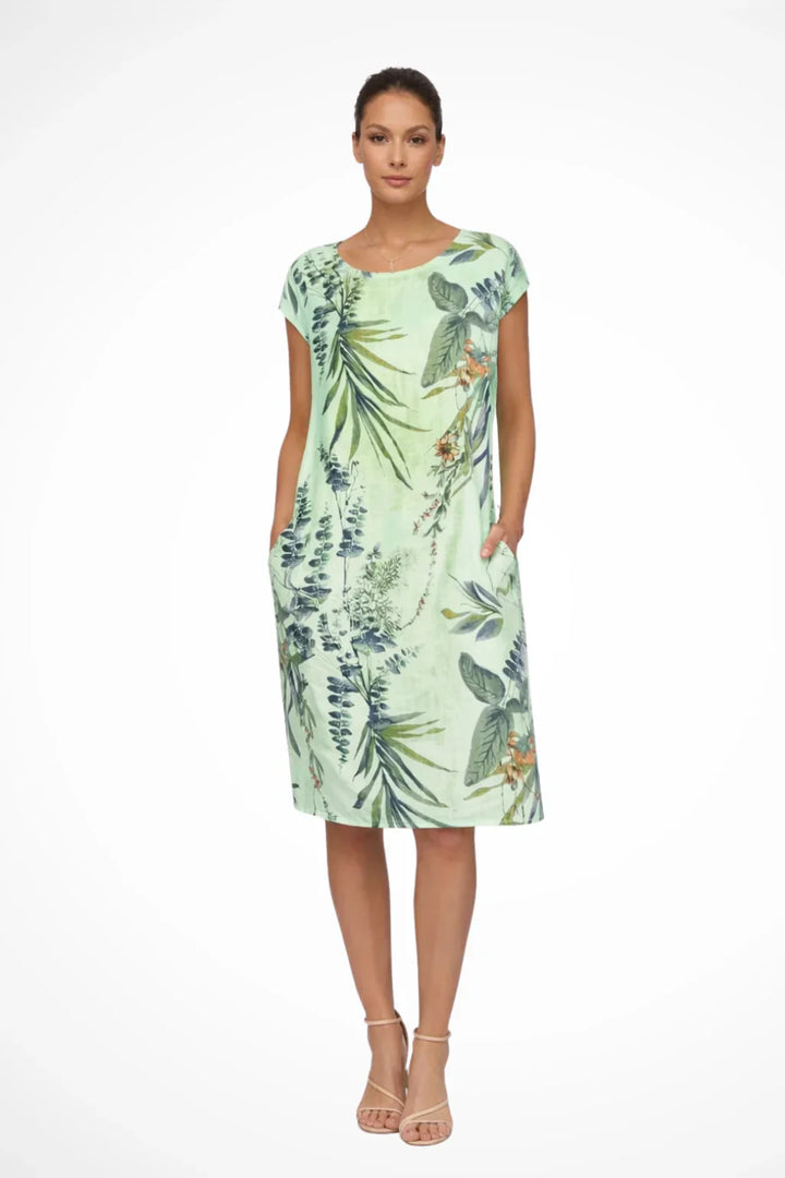Summer shift dress in white base with green and brown botanical foliage print