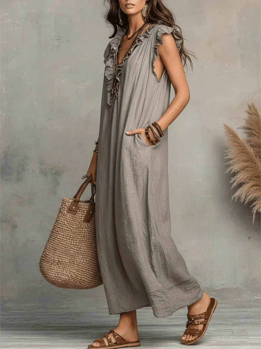 Full-body shot of ruffle V-neck maxi dress in natural light setting