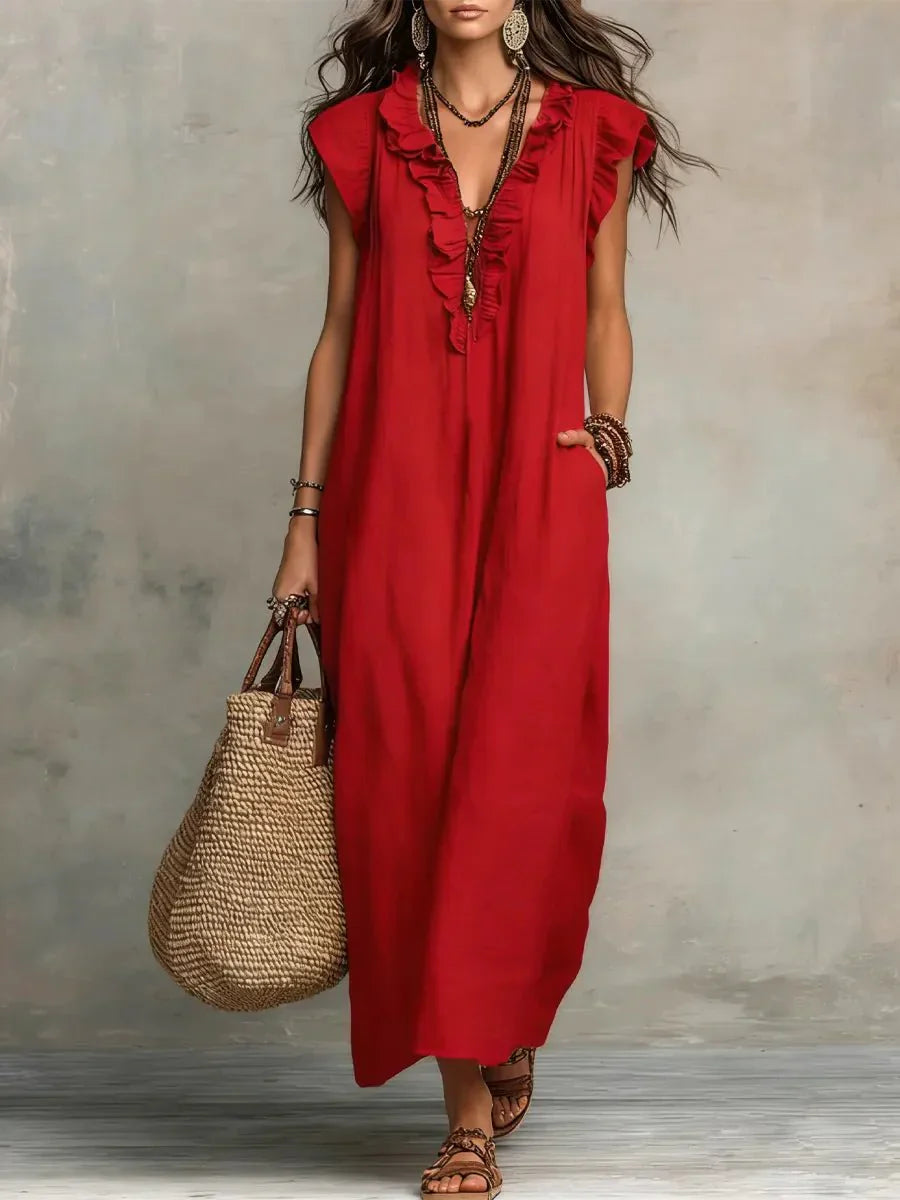 Back view of flutter sleeve maxi dress with straight-falling silhouette