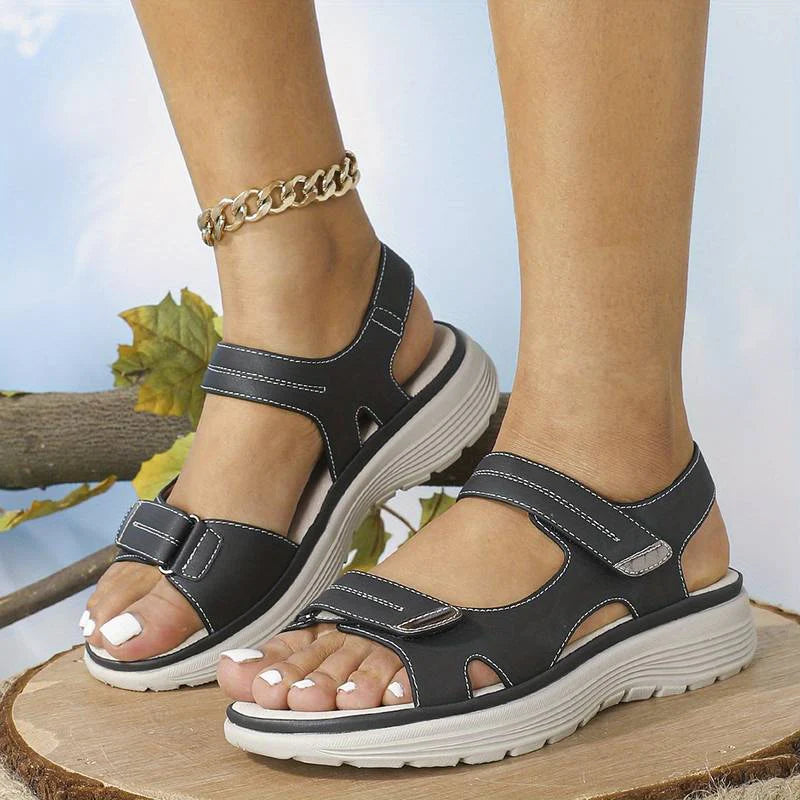 Detail of women's walking sandals showing cushioned footbed and structured sole for everyday comfort