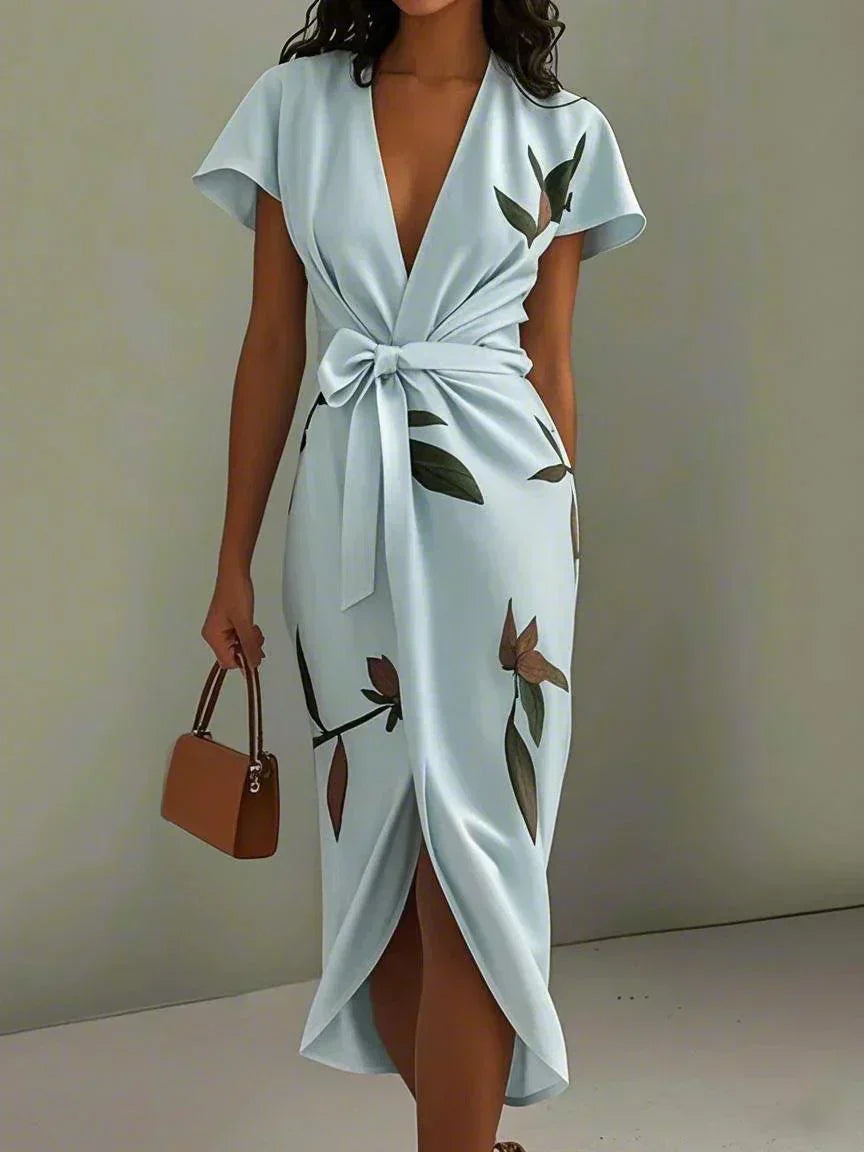Front view of wrap midi dress showing tie waist and short sleeves