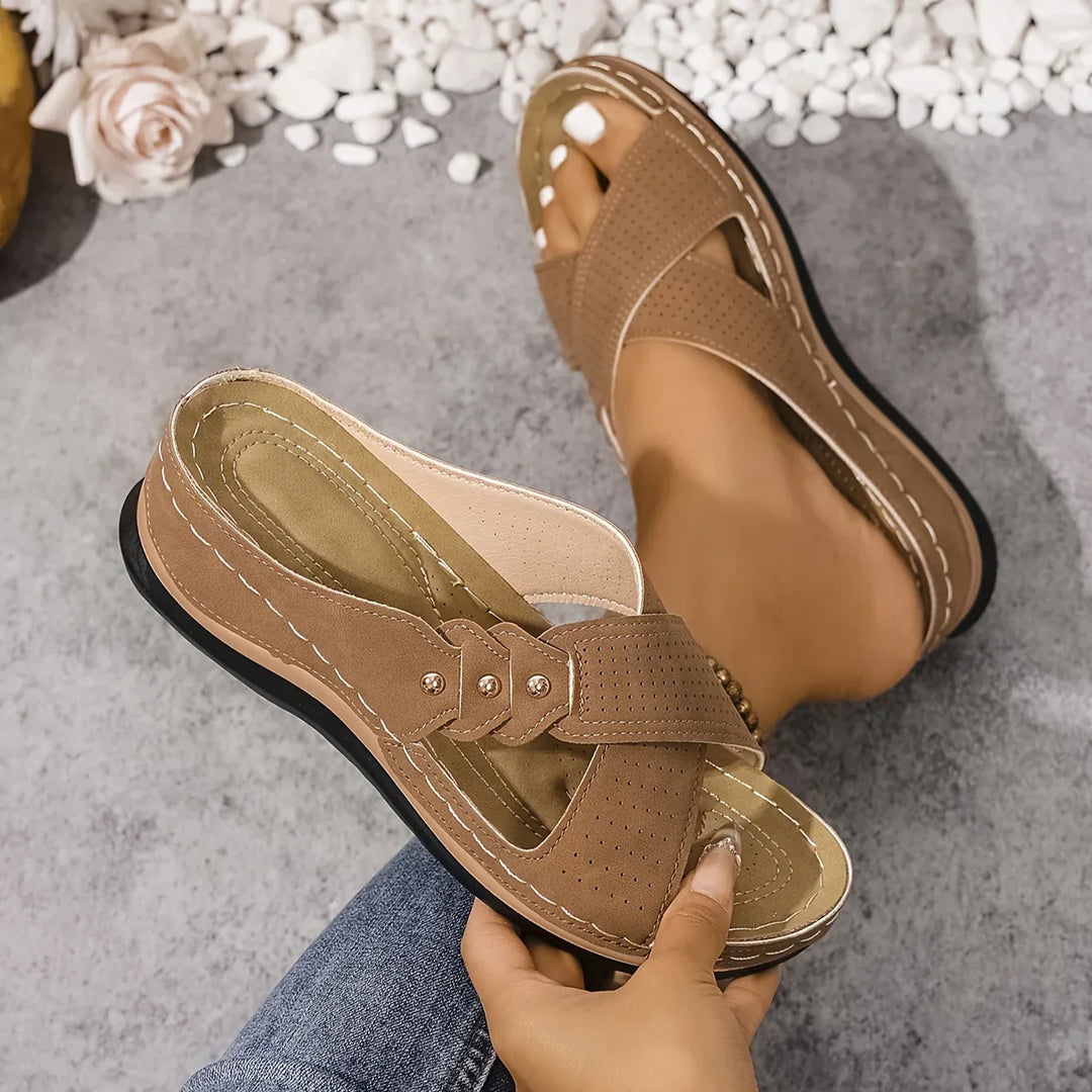 Women's perforated wedge sandals with crossover straps and cushioned insole for summer wear