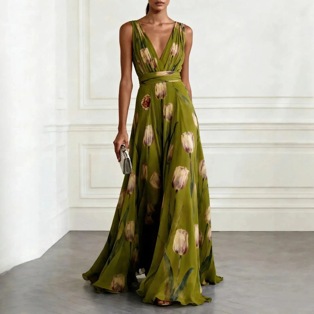 Floor-length floral dress with tie waist detail and graceful drape
